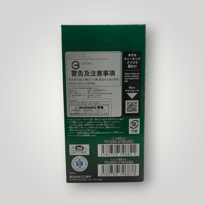 Green sealed booster box for Japanese One Piece card game with white warning label and barcodes.