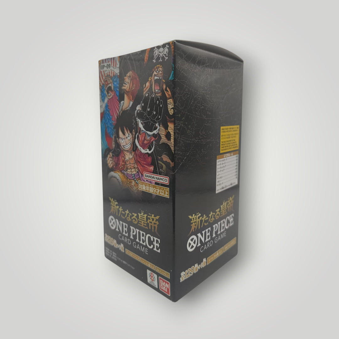 Black Japanese ONE PIECE OP-09 Emperors in the New World booster box with colorful character art and gold text.