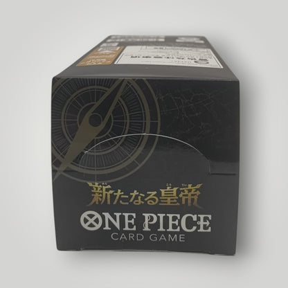 Black ONE PIECE Card Game booster box with gold Japanese text and compass design.