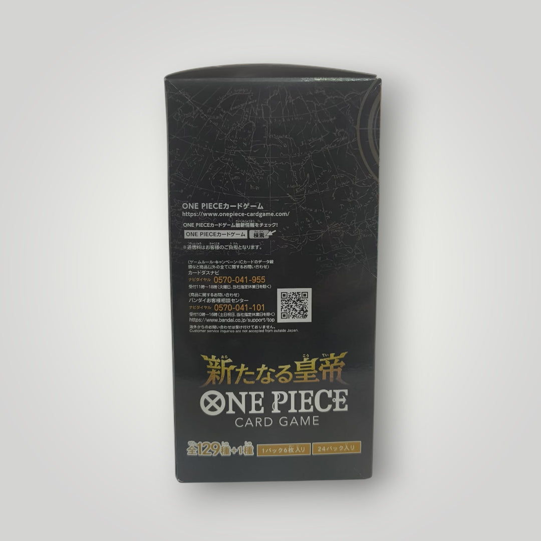 Black booster box for One Piece Card Game with gold Japanese text and QR code on back panel.
