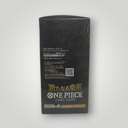 Black booster box for One Piece Card Game with gold Japanese text and QR code on back panel.