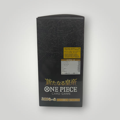Black OP-09 Emperors in the New World ONE PIECE Japanese card game booster box with gold and white text.