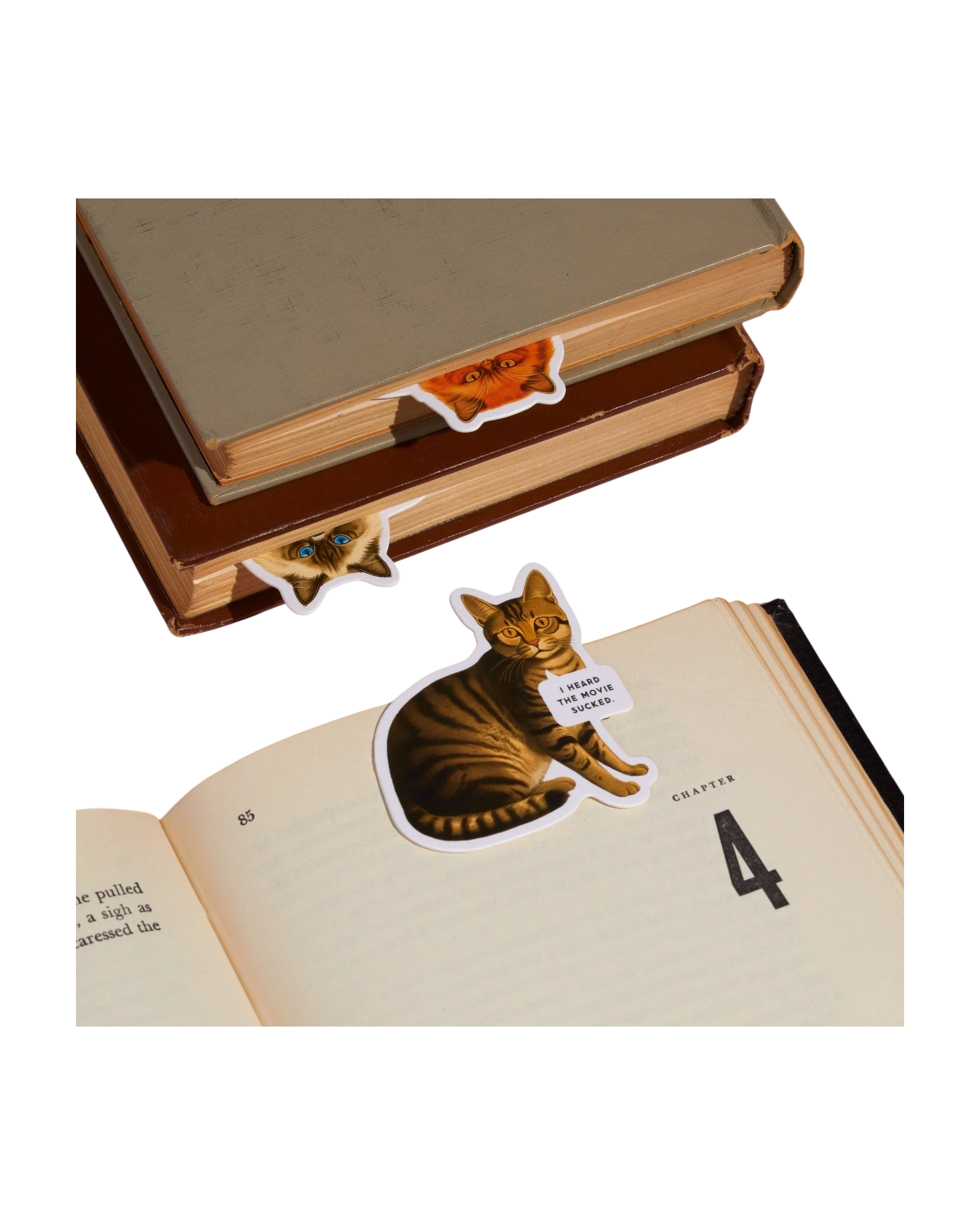 Ripperholics Moody Cats magnetic bookmark set featuring three illustrated cat designs clipped onto open books