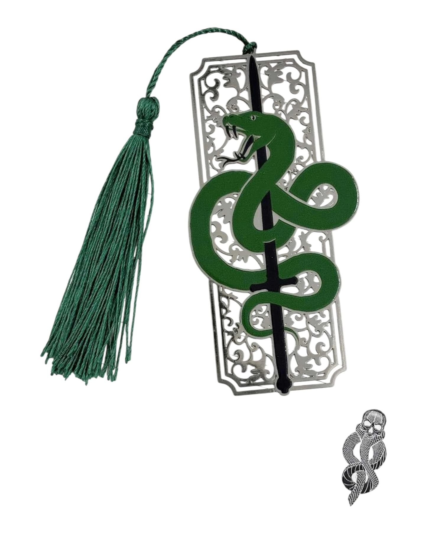 Ripperholics Harry Potter Nagini metal bookmark with green silk tassel resting on a lined page with Dark Mark icon
